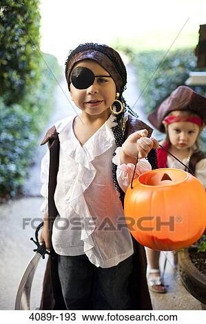 Girls playing Trick Or Treat View Large Photo Image Stock Image - Girls playing Trick Or Treat. Fotosearch