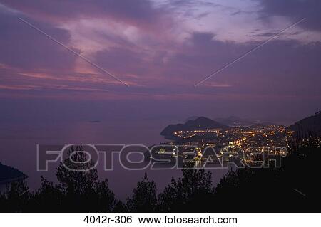 Stock Photograph - High angle view of a town at the waterfront, Dubrovnik, Croatia. Fotosearch
