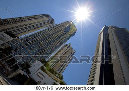 Low angle view of skyscrapers in a city View Large Photo Image Stock Photograph - Low angle view of skyscrapers in a city. Fotosearch