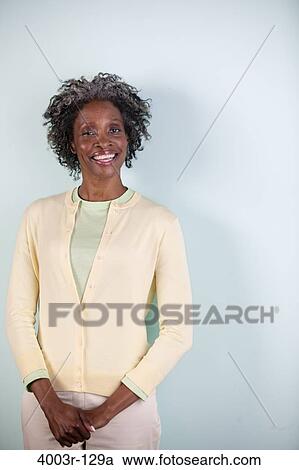 Portrait of a businesswoman smiling View Large Photo Image Stock Image - Portrait of a businesswoman smiling. Fotosearch