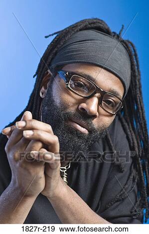 Portrait of a mid adult man posing View Large Photo Image Stock Photo - Portrait of a mid adult man posing. Fotosearch
