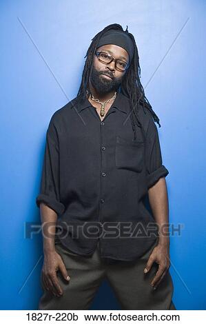 Portrait of a mid adult man standing View Large Photo Image Stock Image - Portrait of a mid adult man standing. Fotosearch
