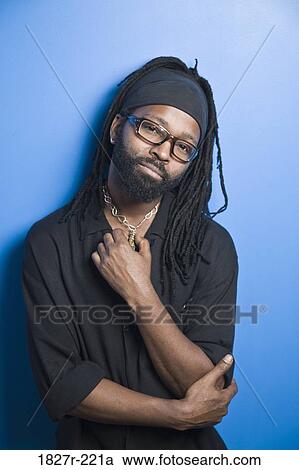 Portrait of a mid adult man standing View Large Photo Image Stock Image - Portrait of a mid adult man standing. Fotosearch