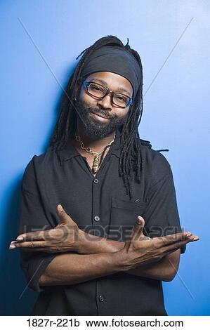 Portrait of a mid adult man standing View Large Photo Image Stock Image - Portrait of a mid adult man standing. Fotosearch
