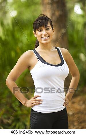 Portrait of a young woman smiling View Large Photo Image Stock Image - Portrait of a young woman smiling. Fotosearch