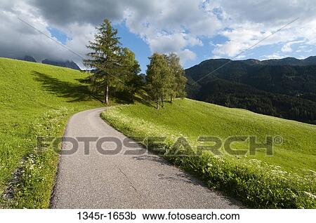Road passing through a hill, Santa Maddalena, Funes Valley, Dolomites, Trentino-Alto-Adige, Italy View Large Photo Image Stock Image - Road passing through a hill, Santa Maddalena, Funes Valley, Dolomites, Trentino-Alto-Adige, Italy. Fotosearch