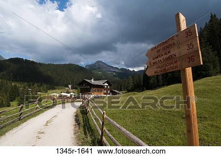 Street name sign on roadside, Santa Maddalena, Funes Valley, Dolomites, Trentino-Alto-Adige, Italy View Large Photo Image Stock Image - Street name sign on roadside, Santa Maddalena, Funes Valley, Dolomites, Trentino-Alto-Adige, Italy. Fotosearch