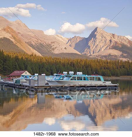 Tour Boats, Maligne Lake, Jasper National Park, Alberta, Canada View Large Photo Image Stock Photo - Tour Boats, Maligne Lake, Jasper National Park, Alberta, Canada. Fotosearch