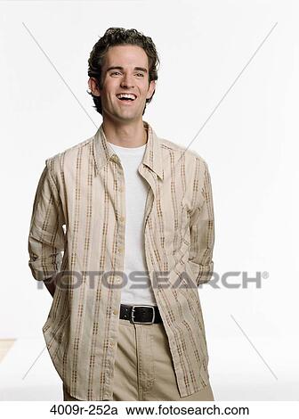 Young man smiling View Large Photo Image Stock Image - Young man smiling. Fotosearch