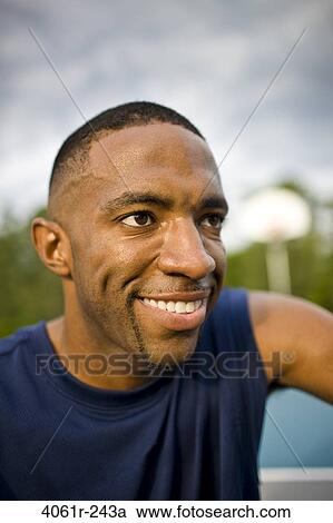 Young man smiling View Large Photo Image Stock Image - Young man smiling. Fotosearch