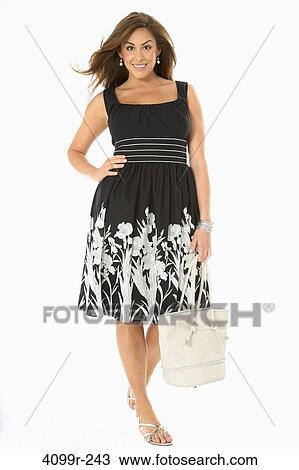 Young woman smiling View Large Photo Image Stock Image - Young woman smiling. Fotosearch