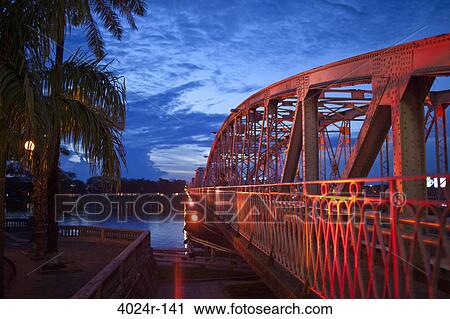 Bridge lit up at dusk, Trang Tien Bridge, Perfume River, Hue, Vietnam View Large Photo Image Stock Image - Bridge lit up at dusk, Trang Tien Bridge, Perfume River, Hue, Vietnam. Fotosearch