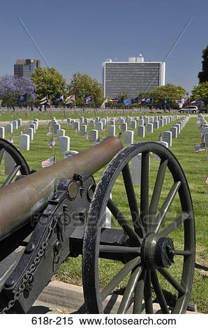 Cannon in a cemetery with a government building in the background, Westwood Federal, Los Angeles National Cemetery, Los Angeles, California, USA View Large Photo Image Stock Photography - Cannon in a cemetery with a government building in the background, Westwood Federal, Los Angeles National Cemetery, Los Angeles, California, USA. Fotosearch