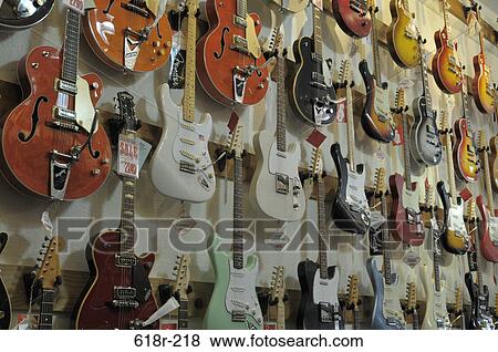 Guitars on display View Large Photo Image Stock Photo - Guitars on display. Fotosearch