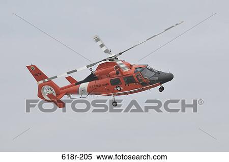 Helicopter in flight, Eurocopter HH-65 Dolphin, LAX Airport, Los Angeles, California, USA View Large Photo Image Stock Photography - Helicopter in flight, Eurocopter HH-65 Dolphin, LAX Airport, Los Angeles, California, USA. Fotosearch