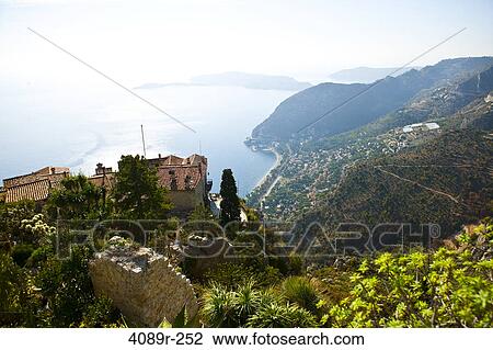 High angle view of a coastal town and French Riviera viewed from medieval village of Eze, France View Large Photo Image Stock Image - High angle view of a coastal town and French Riviera viewed from medieval village of Eze, France. Fotosearch