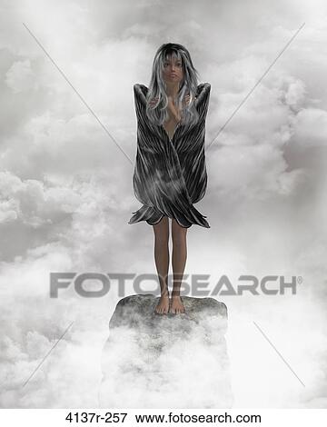 Angel standing on a rock with wings folded on a rock View Large Photo Image Stock Photo - Angel standing on a rock with wings folded on a rock. Fotosearch