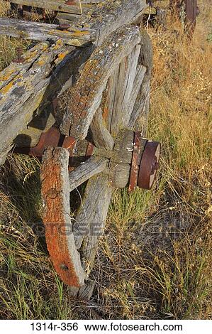 Close-up of old wagon wheel View Large Photo Image Stock Photograph - Close-up of old wagon wheel. Fotosearch