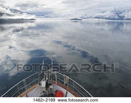 Stock Photo - Delphinus ship in the ocean, Alaska, USA. Fotosearch