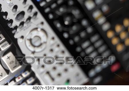 High angle view of remote controls View Large Photo Image Stock Photo - High angle view of remote controls. Fotosearch