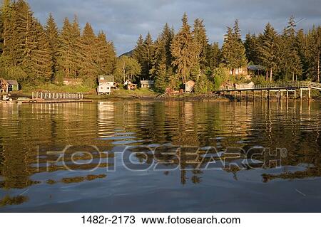 Houses at the waterfront at sunset, Meyers Chuck, Alaska, USA View Large Photo Image Stock Image - Houses at the waterfront at sunset, Meyers Chuck, Alaska, USA. Fotosearch