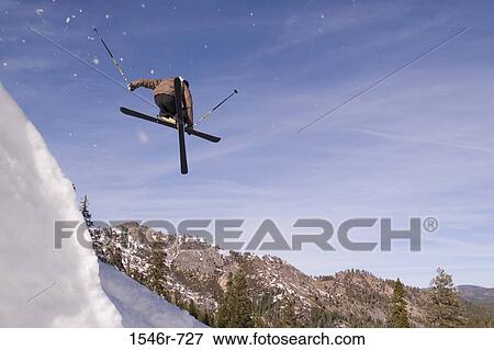 Low angle view of a skier jumping, Alpine Meadow, Lake Tahoe, California, USA View Large Photo Image Stock Photo - Low angle view of a skier jumping, Alpine Meadow, Lake Tahoe, California, USA. Fotosearch