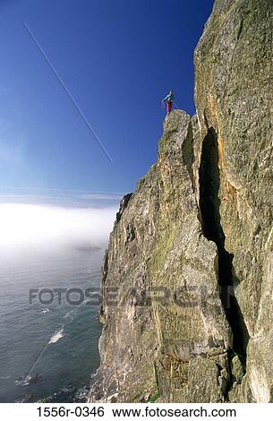 Person mountain climbing, Gogarth, Anglesey, Wales View Large Photo Image Stock Photograph - Person mountain climbing, Gogarth, Anglesey, Wales. Fotosearch