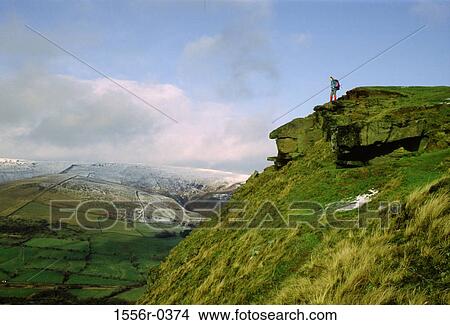 Person trekking in the Peaks, Mam Tor Ridge, Peak District National Park View Large Photo Image Picture - Person trekking in the Peaks, Mam Tor Ridge, Peak District National Park. Fotosearch