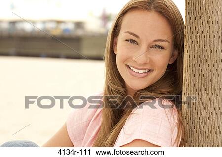 Portrait of a woman smiling, Santa Monica Beach, Santa Monica, California, USA View Large Photo Image Stock Image - Portrait of a woman smiling, Santa Monica Beach, Santa Monica, California, USA. Fotosearch