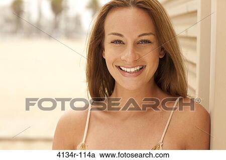 Portrait of a woman smiling, Santa Monica Beach, Santa Monica, California, USA View Large Photo Image Stock Image - Portrait of a woman smiling, Santa Monica Beach, Santa Monica, California, USA. Fotosearch