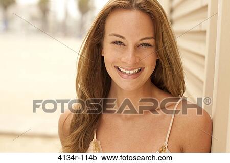 Portrait of a woman smiling, Santa Monica Beach, Santa Monica, California, USA View Large Photo Image Stock Image - Portrait of a woman smiling, Santa Monica Beach, Santa Monica, California, USA. Fotosearch