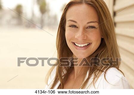 Portrait of a woman smiling, Santa Monica Beach, Santa Monica, California, USA View Large Photo Image Stock Photograph - Portrait of a woman smiling, Santa Monica Beach, Santa Monica, California, USA. Fotosearch