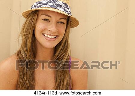 Stock Image - Portrait of a woman smiling. Fotosearch
