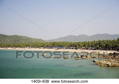 Stock Photo - Rocks on the beach, Palolem Beach, Goa, India. Fotosearch
