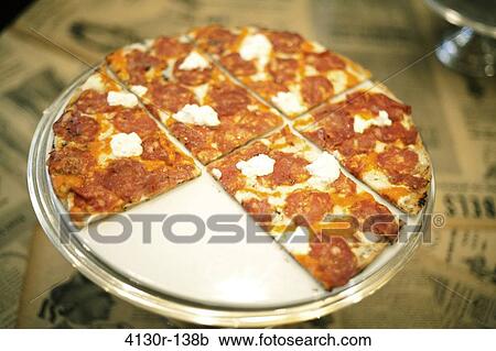 Stock Image - USA, New York State, New York City, Brooklyn, Park Slope, Fornino, Pizza Vinny Scotto with missing slice. Fotosearch