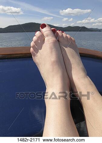 Woman's legs on the boat, Alaska, USA View Large Photo Image Stock Image - Woman's legs on the boat, Alaska, USA. Fotosearch