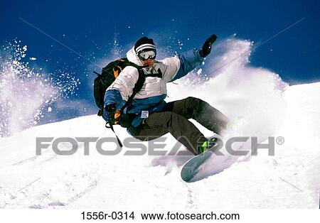 Young adult man sliding down hill View Large Photo Image Picture - Young adult man sliding down hill. Fotosearch