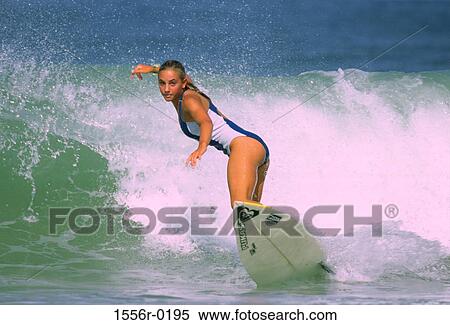 Young adult woman surfing, France View Large Photo Image Stock Photography - Young adult woman surfing, France. Fotosearch