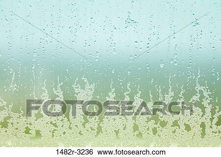 Melting snow on window View Large Photo Image Stock Photograph - Melting snow on window. Fotosearch