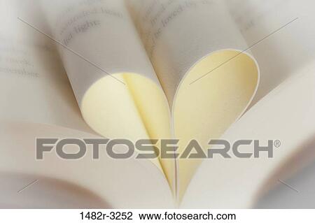 Pages in book folded to form heart View Large Photo Image Stock Image - Pages in book folded to form heart. Fotosearch