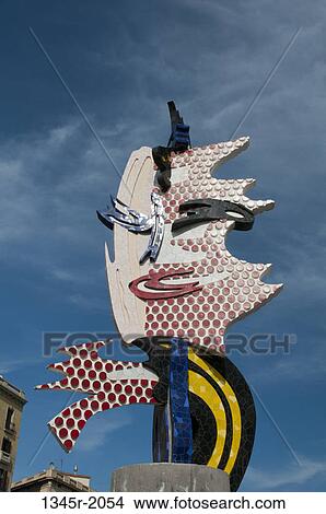 Spain, Barcelona, Placa d'Antoni Lopez, Sculpture 'Barcelona Head' by Roy Lichtenstein View Large Photo Image Picture - Spain, Barcelona, Placa d'Antoni Lopez, Sculpture 'Barcelona Head' by Roy Lichtenstein. Fotosearch