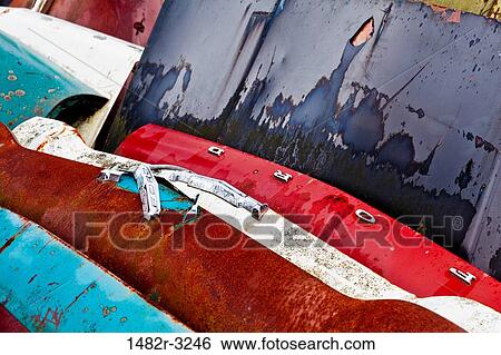 Stacked car hoods in wrecking yard View Large Photo Image Stock Photograph - Stacked car hoods in wrecking yard. Fotosearch
