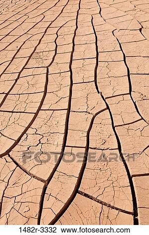 USA, Arizona, Painted Rocks Petroglyph Site, near Gila Bend, Dried up and cracked river bottom mud View Large Photo Image Stock Image - USA, Arizona, Painted Rocks Petroglyph Site, near Gila Bend, Dried up and cracked river bottom mud. Fotosearch