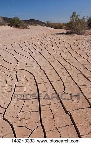 USA, Arizona, Painted Rocks Petroglyph Site, near Gila Bend, Dried up and cracked river bottom mud View Large Photo Image Stock Image - USA, Arizona, Painted Rocks Petroglyph Site, near Gila Bend, Dried up and cracked river bottom mud. Fotosearch