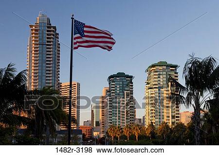 USA, California, San Diego, Children's Park, American Flag with highrise buildings View Large Photo Image Stock Photo - USA, California, San Diego, Children's Park, American Flag with highrise buildings. Fotosearch