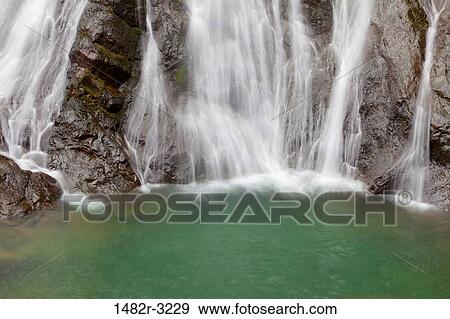 Stock Photo - USA, Washington State, Olympic National Park, Rocky Brook Falls, Waterfall. Fotosearch