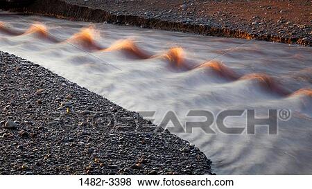 USA, Washington State, Waves in Stream at Sunset, Rialto Beach, Olympic National Park View Large Photo Image Stock Photo - USA, Washington State, Waves in Stream at Sunset, Rialto Beach, Olympic National Park. Fotosearch