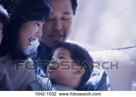 Asian, people, talking, smiling, shadows, listening, attentive View Large Photo Image Stock Image - Asian, people, talking, smiling, shadows, listening, attentive. Fotosearch