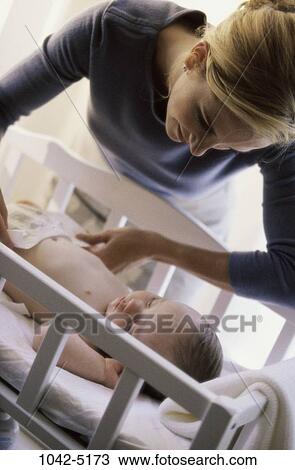 baby, people, mother, sleeping, diaper, crib, attentive View Large Photo Image Stock Image - baby, people, mother, sleeping, diaper, crib, attentive. Fotosearch