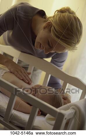 bed, people, baby, mother, sleeping, crib, attentive View Large Photo Image Stock Image - bed, people, baby, mother, sleeping, crib, attentive. Fotosearch